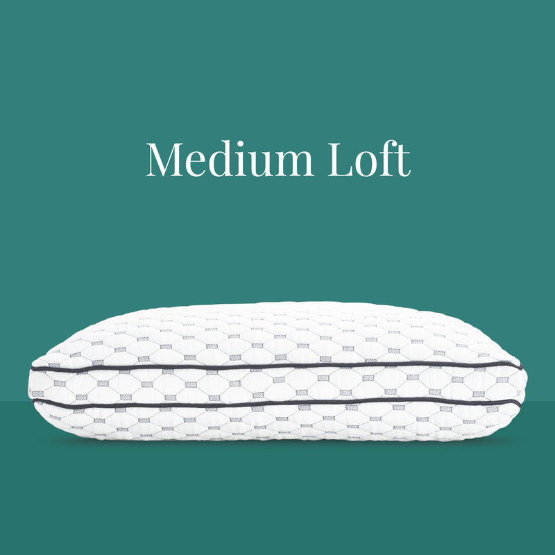 Medium Loft. A white pillow with gray piping.