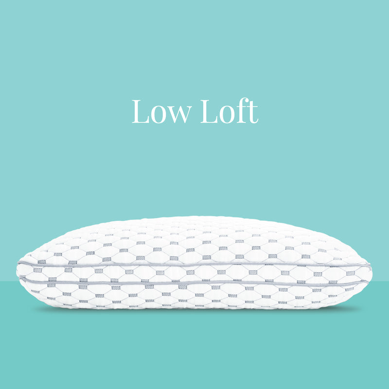 Low Loft. A white pillow with light gray piping.